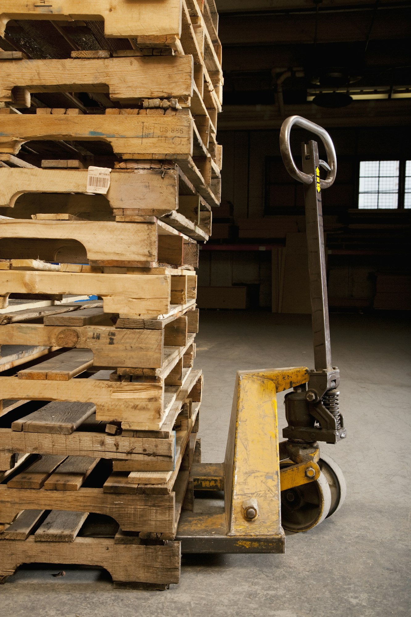 Hand Truck and Wooden Pallets